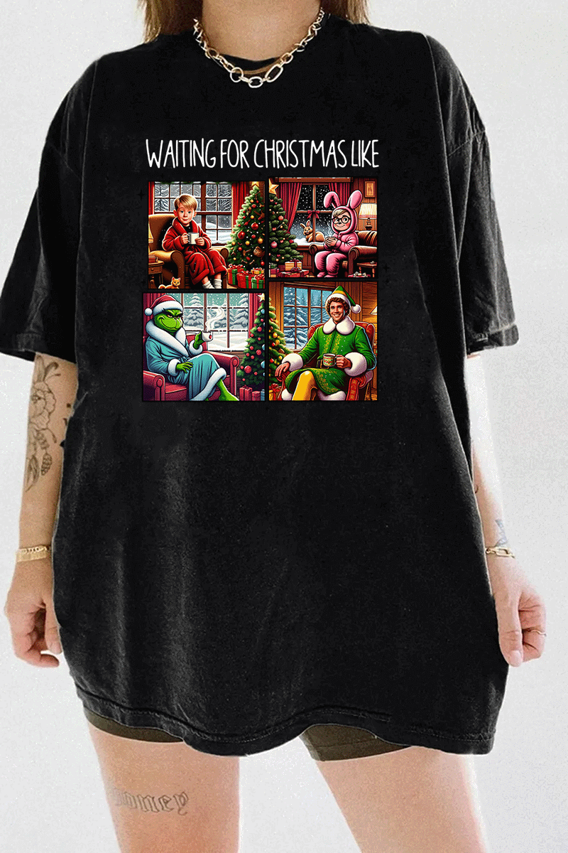 Ragglo black tee featuring four classic Christmas movie characters waiting by decorated trees with 'WAITING FOR CHRISTMAS LIKE' text, perfect for festive holiday streetwear and movie fans.

