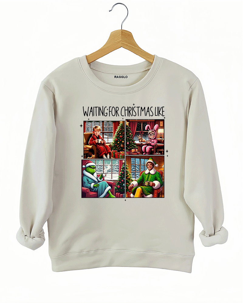 Ragglo beige sweatshirt showcasing the 'Waiting for Christmas Like' design, with nostalgic Christmas movie characters such as The Grinch and Buddy the Elf eagerly anticipating Christmas.